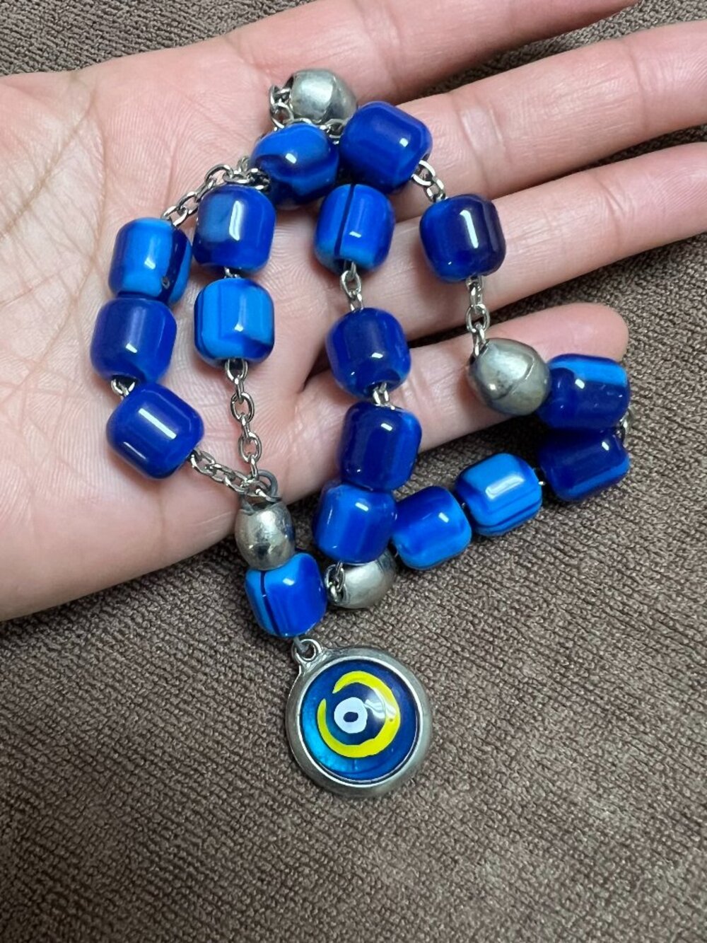Blue bead evil eye pendant necklace silver tone